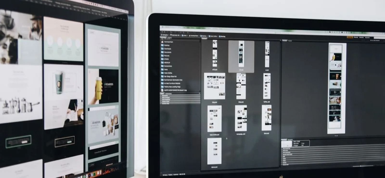 Website designs shown on two computer screens during the design phase