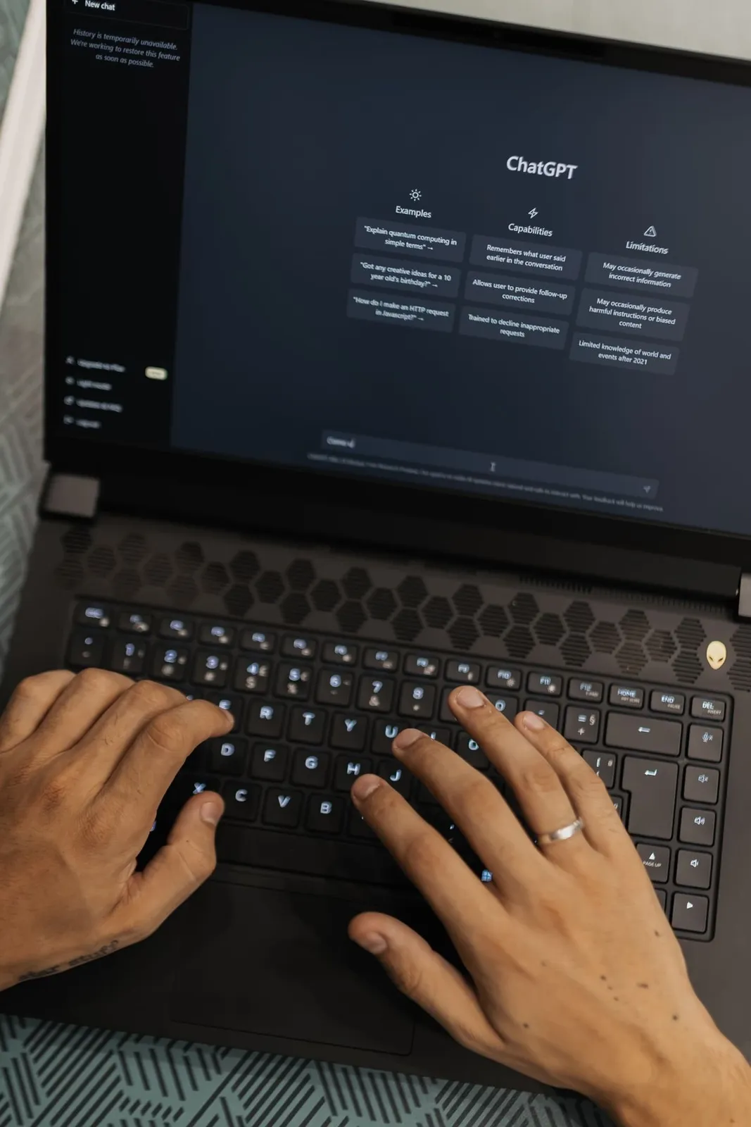 A user asking a question in an AI chat tool on a laptop
