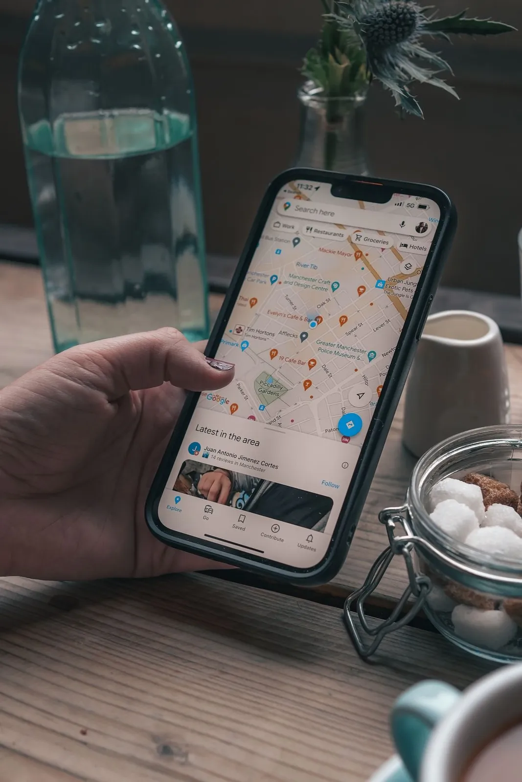 A neighborhood shop marked with a location pin on a mobile map app
